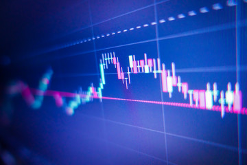 Blue stock exchange market graph on LED screen for business analysis. Finance and economic graphs.