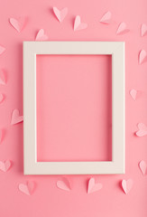 pink pastel background with white frame and hearts