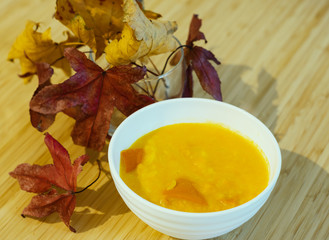 Pumpkin porriedge  and autumn leaves