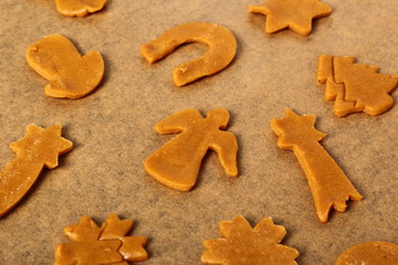 Raw gingerbread cookies ready to baking. Making Christmas Gingerbread Cookies