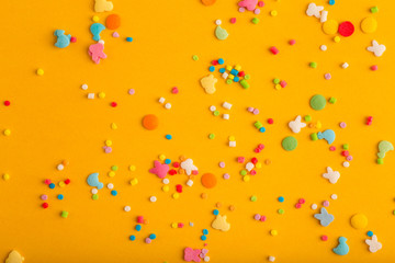 yellow background with multicolored sprincle