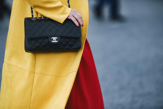 Paris, France - March 05, 2019: Street style outfit -  Woman wearing Chanel purse after a fashion show during Paris Fashion Week - PFWFW19