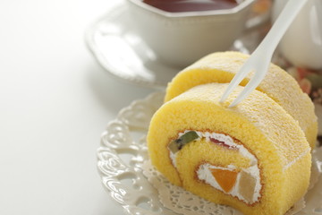 mixed fruit Swiss roll on dish
