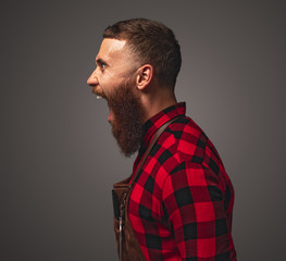 Angry bearded barber screaming loudly