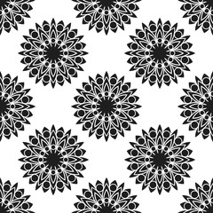 Seamless pattern with abstract flowers. Fashion textile print. Asian fabric background. Vector monochrome design. Perforation floral holes.