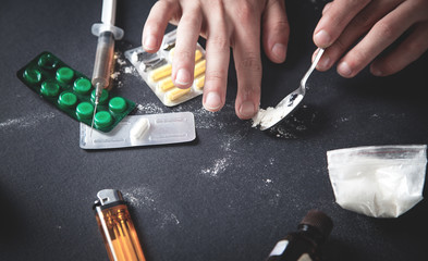 Drug addict taking cocaine. Addiction