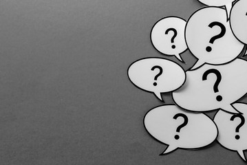 Question marks on speech bubbles side border