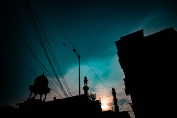 silhouette of regular street buildings