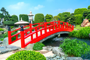 Red bridge in the park Japanese rock gardens as decoration for the garden accents lively culture...