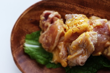 raw chicken and white background with copy space
