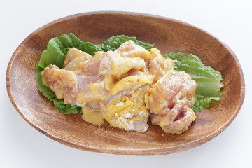 raw chicken and white background with copy space