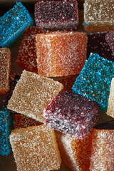 Homemade  multicolored marmalade candy in sugar on dark background. Fruit jelly candies. Fruit...