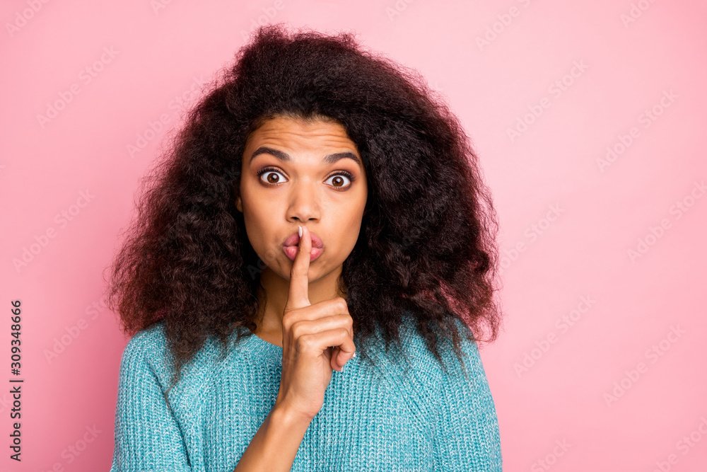 Sticker Photo of woman in blue jumper showing you shh sign to stop your speaking touching lips with forefinger expressing shock on face isolated pastel color background