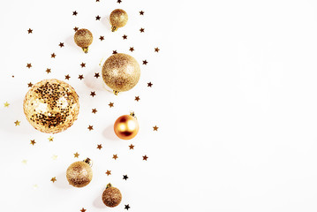 Gold Christmas balls top view, on a white background, ornament, flat lay
