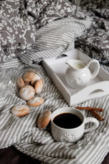 flat lay in scandinavian style. Coffee and breakfast in bed.
