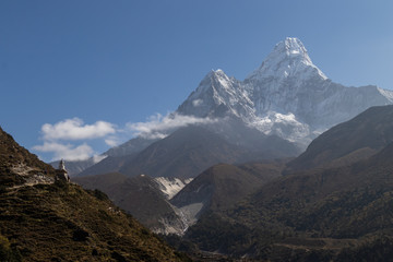Ama Dablam is a mountain in the Himalaya range of eastern Nepal. The main peak is 6,812 metres, the...