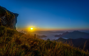 Sunrise and sea of mist, Mountain at Phu chee fa or Phu chi fa in Chiangrai province ,Thailand.