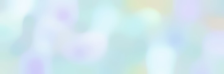 soft blurred horizontal background with powder blue, lavender and light cyan colors and free text space