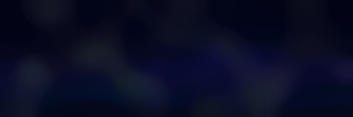 blurred bokeh horizontal background with black and very dark blue colors and free text space