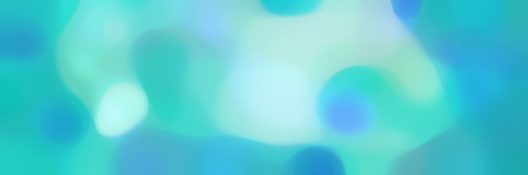 blurred bokeh horizontal background with light sea green, powder blue and sky blue colors and free text space