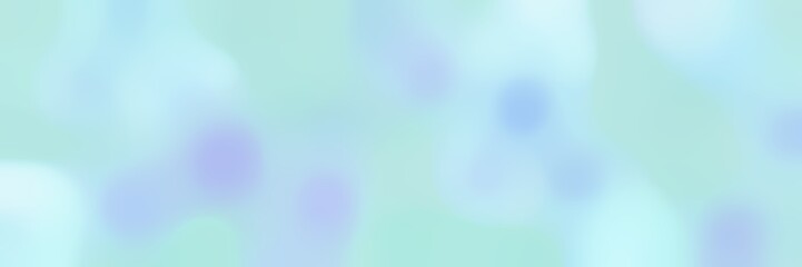 blurred horizontal background with powder blue, light cyan and pale turquoise colors and space for text