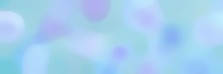 blurred bokeh horizontal background with light blue, lavender blue and sky blue colors space for text or image