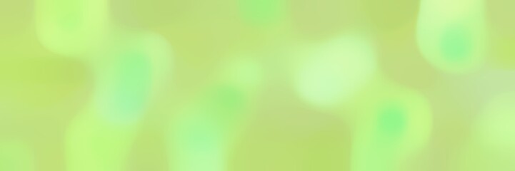 soft blurred horizontal background with pale green, dark khaki and tea green colors space for text or image