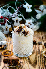 winter hot drink with cream and star anise star