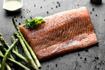 Salmon with asparagus olive oil and herbs