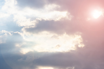 blue clouds on the sky in the rays of the sun in the fall. Landscape background texture, copy space