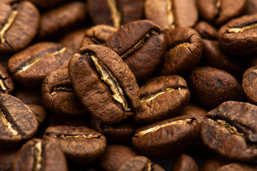 Coffee beans close-up background. Fresh roasted