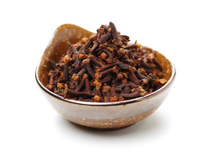 dry cloves on white background