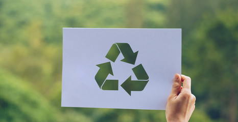 save world ecology concept environmental conservation with hands holding cut out paper recycle...