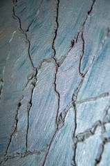 Modern art abstract pattern of curved lines oil paints on gray metallic background