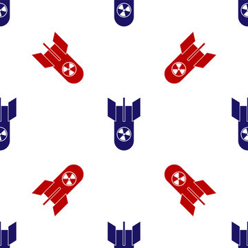 Blue And Red Nuclear Bomb Icon Isolated Seamless Pattern On White Background. Rocket Bomb Flies Down. Vector Illustration