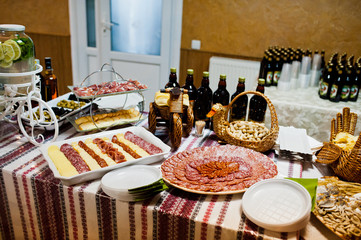 Dessert table of delicious snacks on wedding reception.
