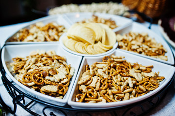Dessert table of delicious snacks on wedding reception.