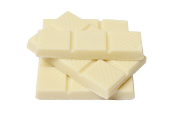 White chocolate pieces isolated on a white background.