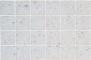 dirty white concrete wall tile with 24 squares in rectangular form