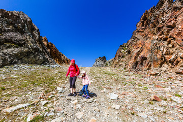 Fototapeta premium Family trekking, mother and daughter camping