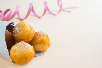 Carnival italian fritters on brown background