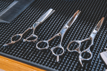 Stylish professional barber scissors. Hairdresser salon concept, hairdressing tool set