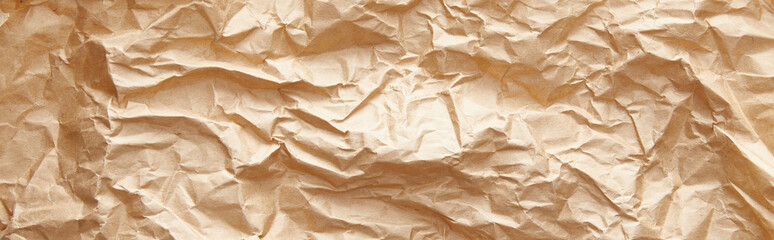top view of empty crumpled craft paper texture, panoramic shot