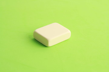 white eraser on color background