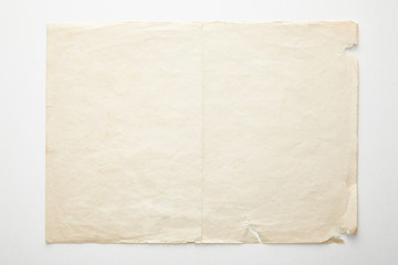 top view of empty vintage paper on white background