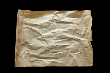 top view of empty crumpled vintage paper isolated on black