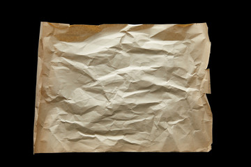 Obraz premium top view of empty crumpled vintage paper isolated on black