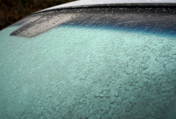 frozen car window after frost