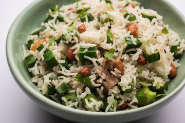 Okra or Bhindi rice also known as Vendakkai Sadam, served in a bowl, selective focus