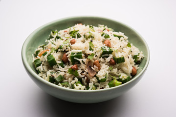 Okra or Bhindi rice also known as Vendakkai Sadam, served in a bowl, selective focus